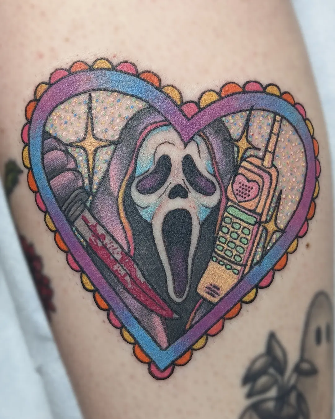 Vibrant Heart Tattoo Featuring Ghostface