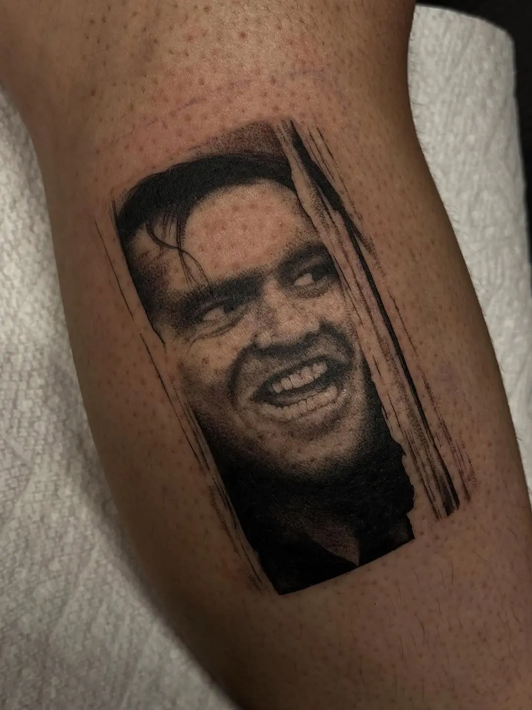 Iconic horror figure tattoo capturing joy gone wrong