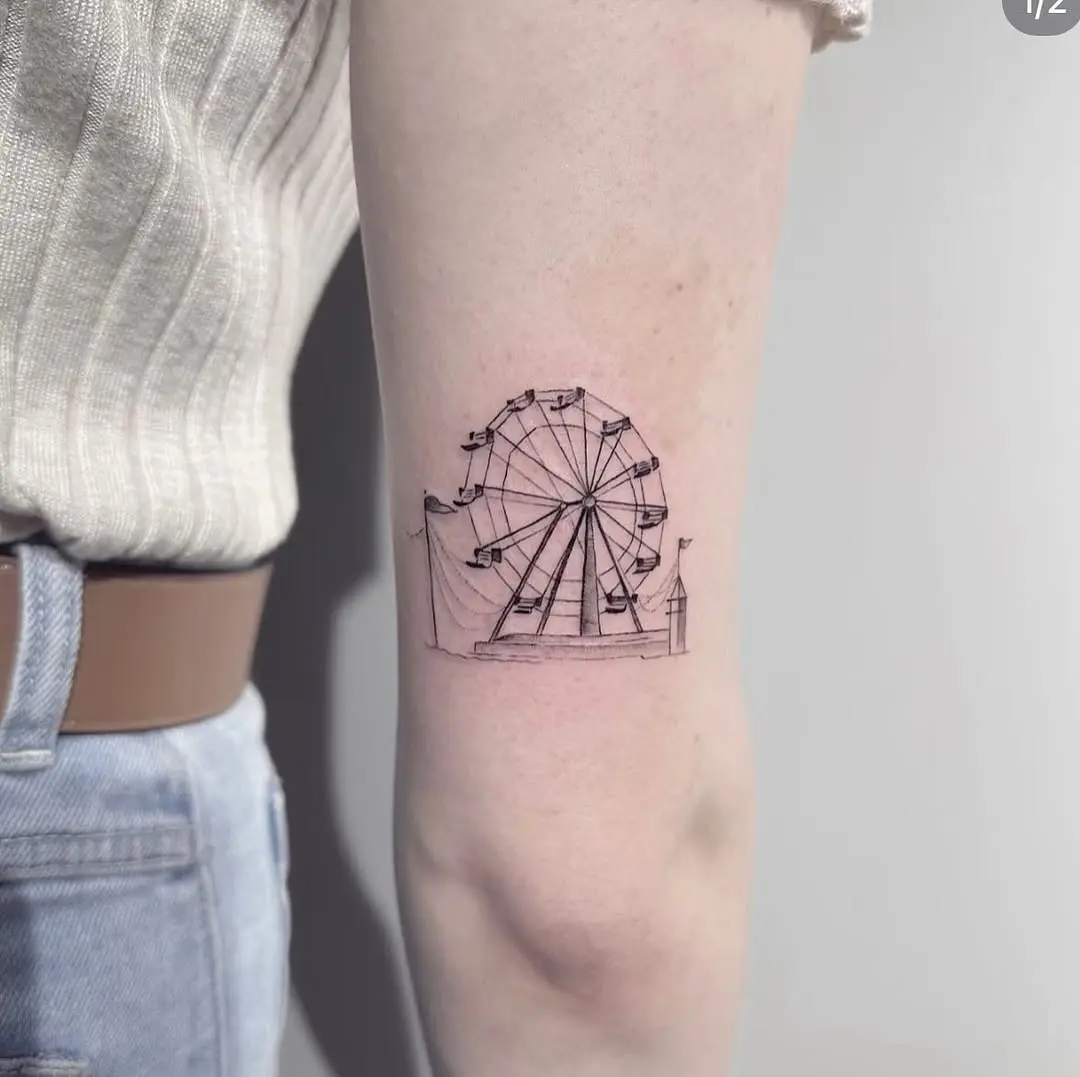 Elegant Ferris wheel tattoo in minimalist style