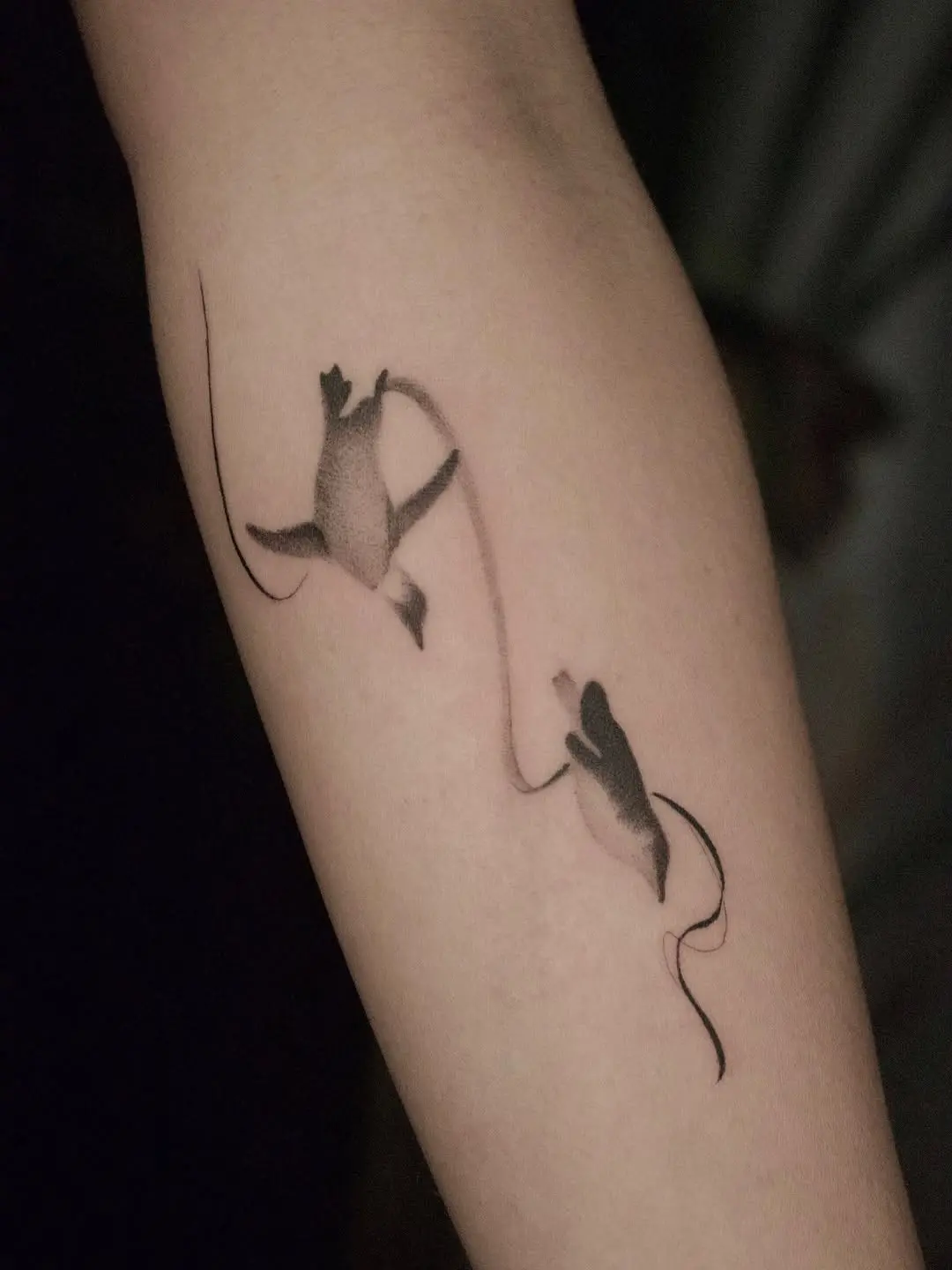 Sleek and minimalistic penguin tattoo design