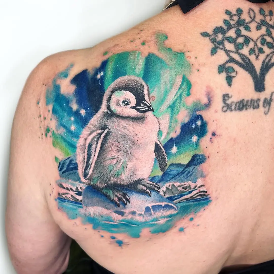 Charming Penguin Tattoo with Aurora Borealis Vibes