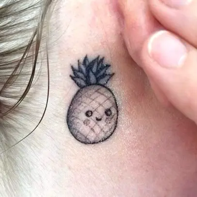 Adorable pineapple tattoo on the ear