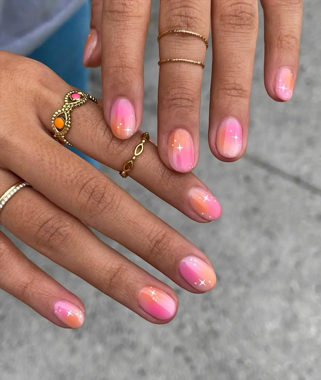 Stylish pink ombre short nails with stars