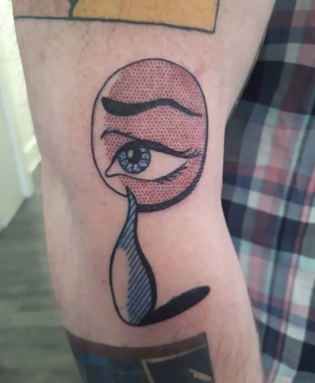 Abstract Eye Tattoo with Minimalist Appeal