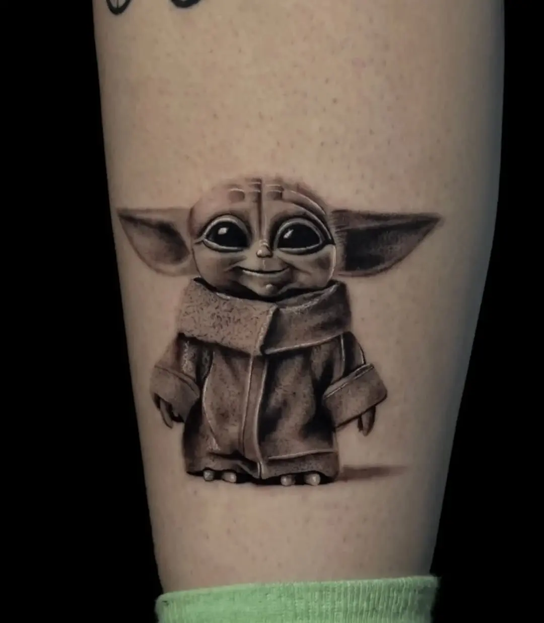 Adorable Yoda Tattoo for Star Wars Fans