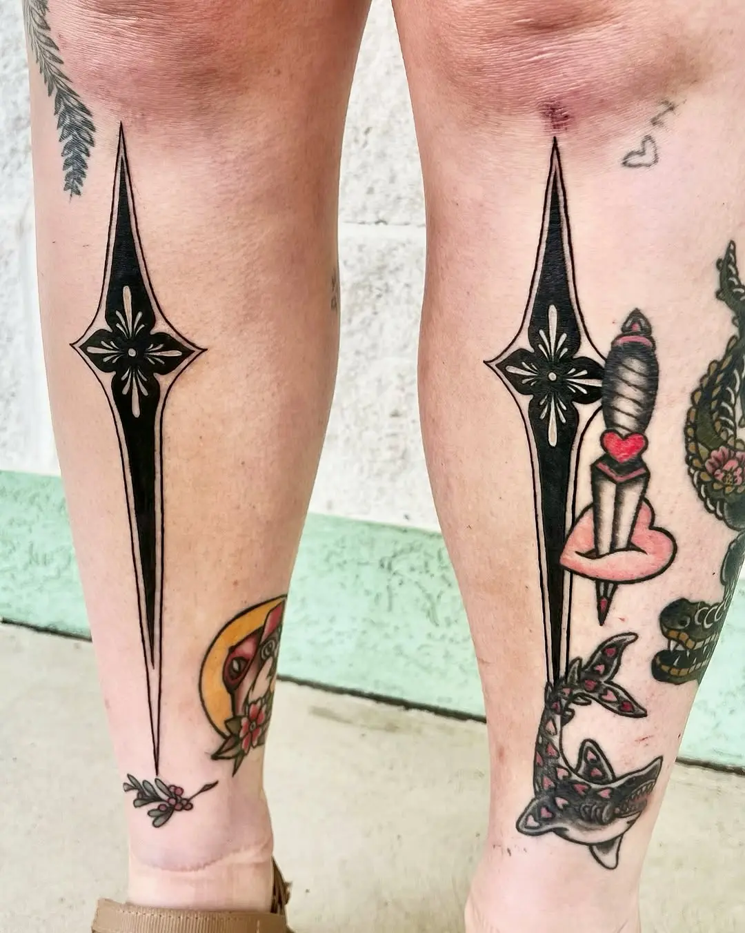 Stylish blackwork designs for shin tattoos
