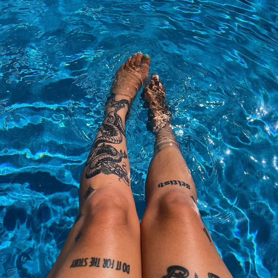 Stylish shin tattoos with aquatic vibes