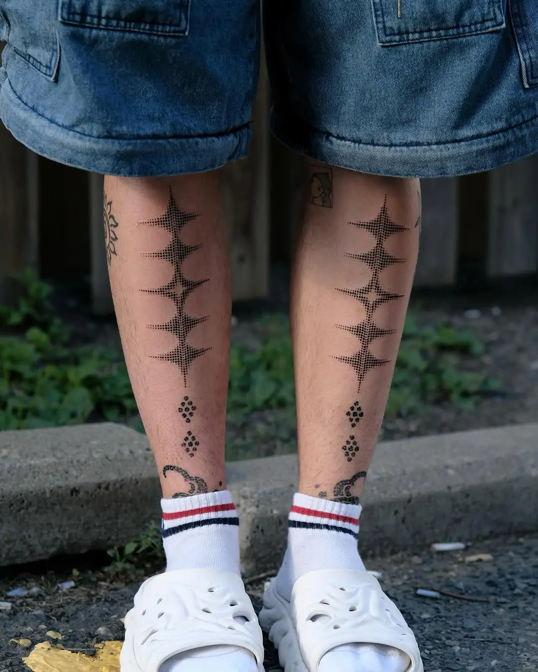 Intricate dotted patterns adorn the shins elegantly