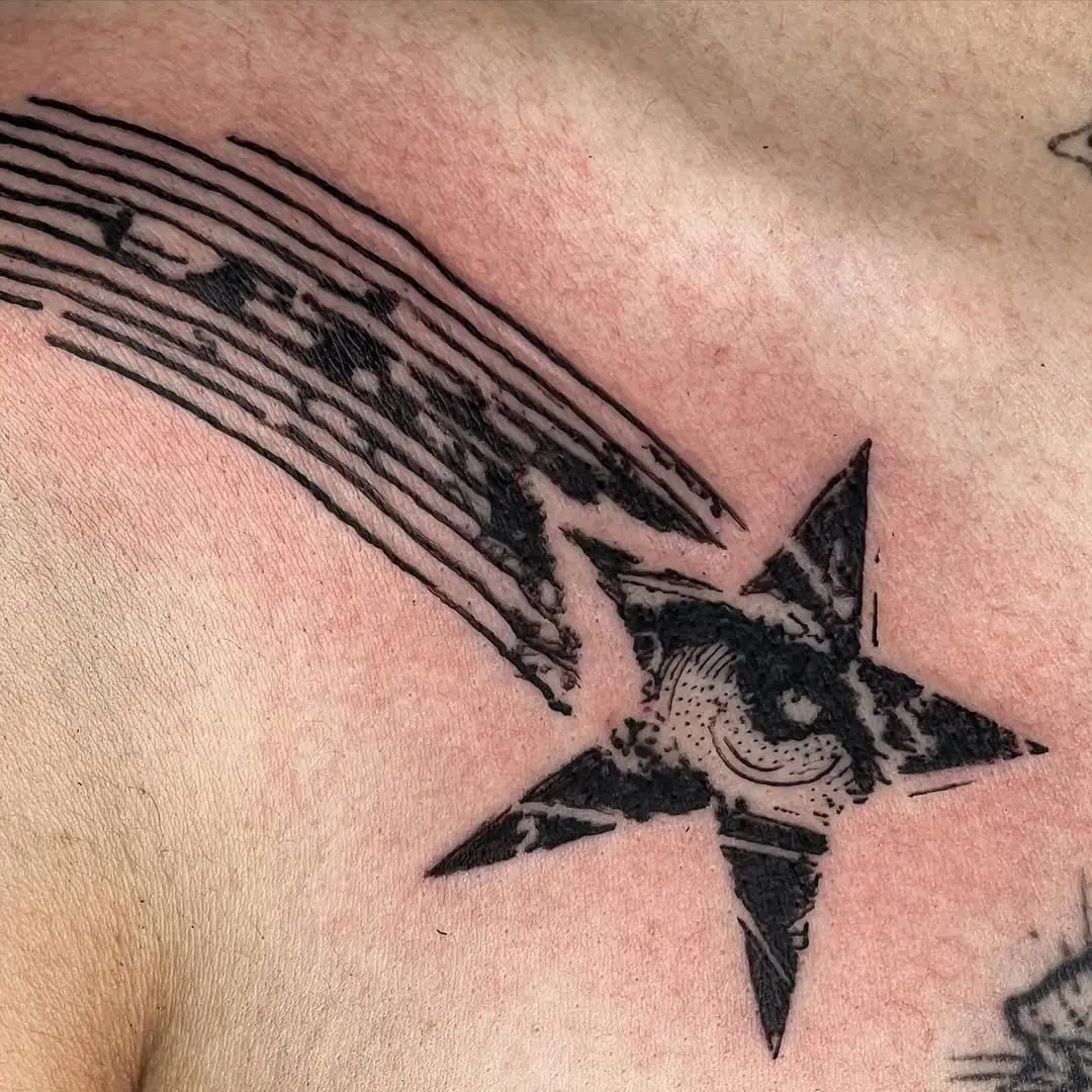 Stunning shooting star tattoo with intricate details