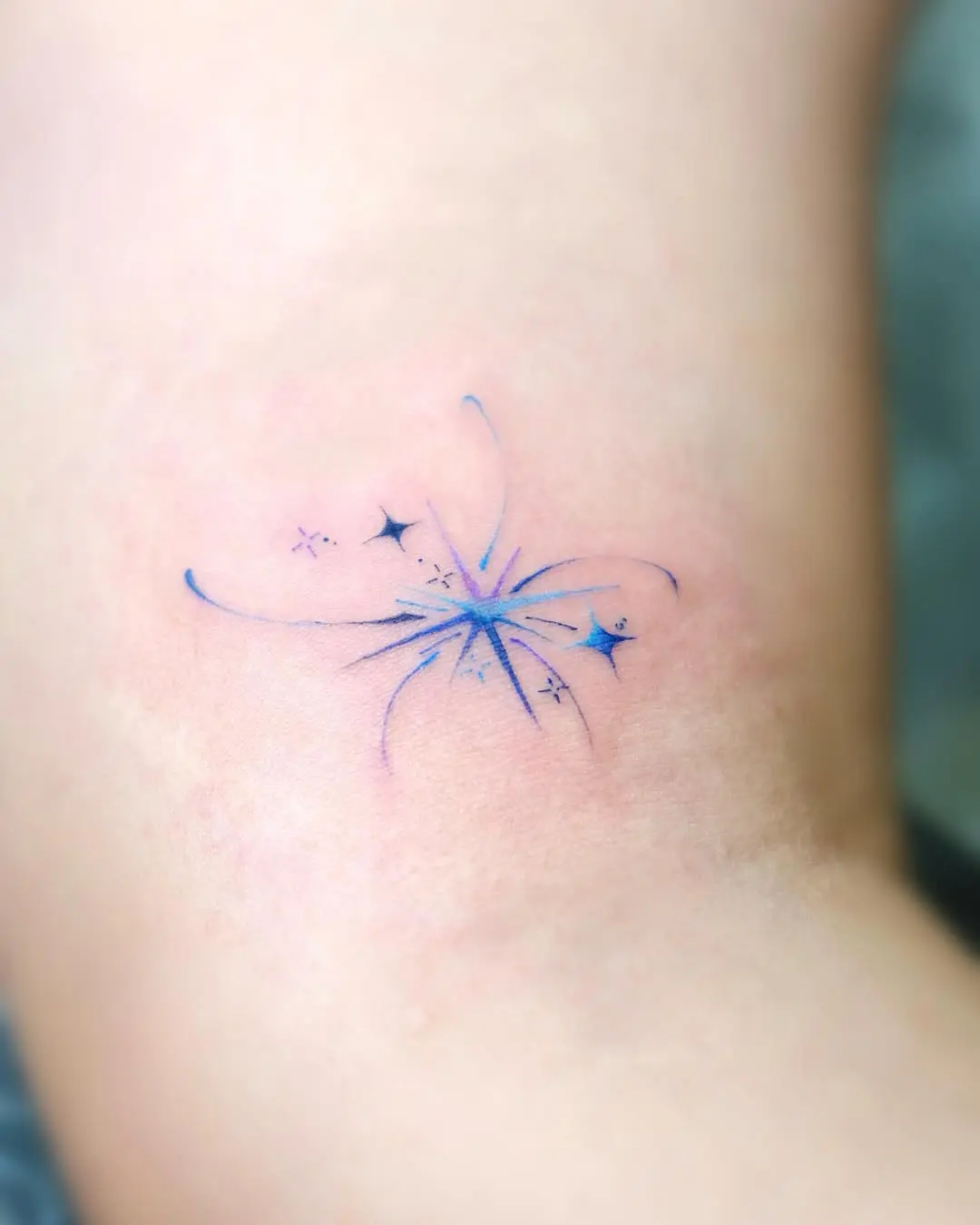 Dreamy and whimsical shooting star tattoo design