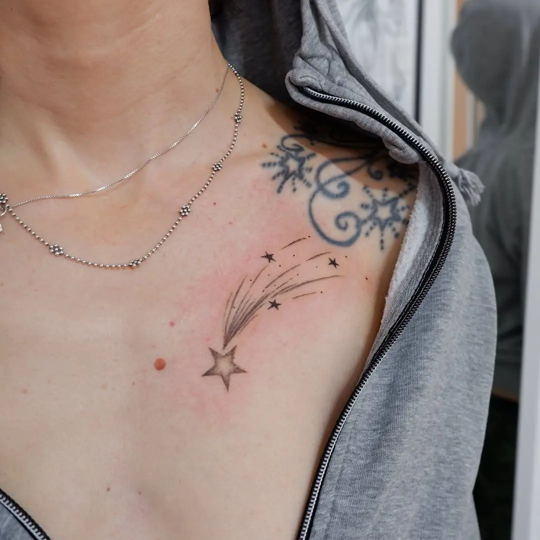 Captivating shooting star tattoo on the shoulder