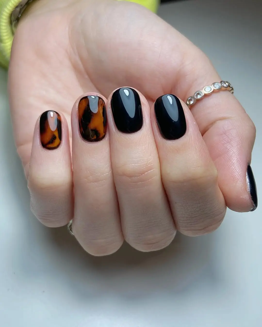 Stylish Short Nails with Tortoiseshell Accent