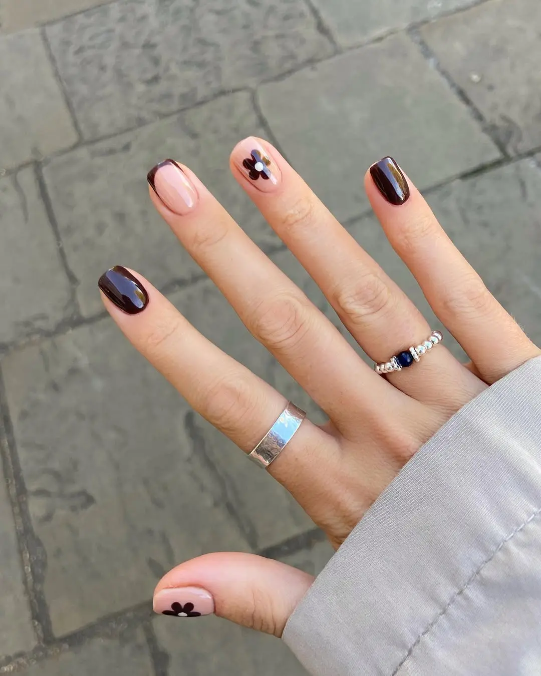 Chic short nails with floral design and dark tips