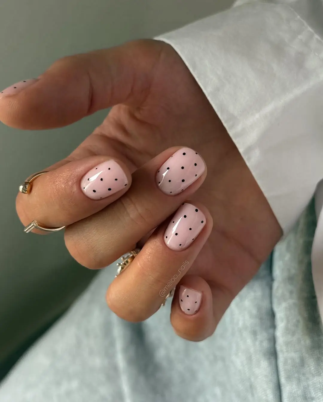 Chic short nails with playful black dots