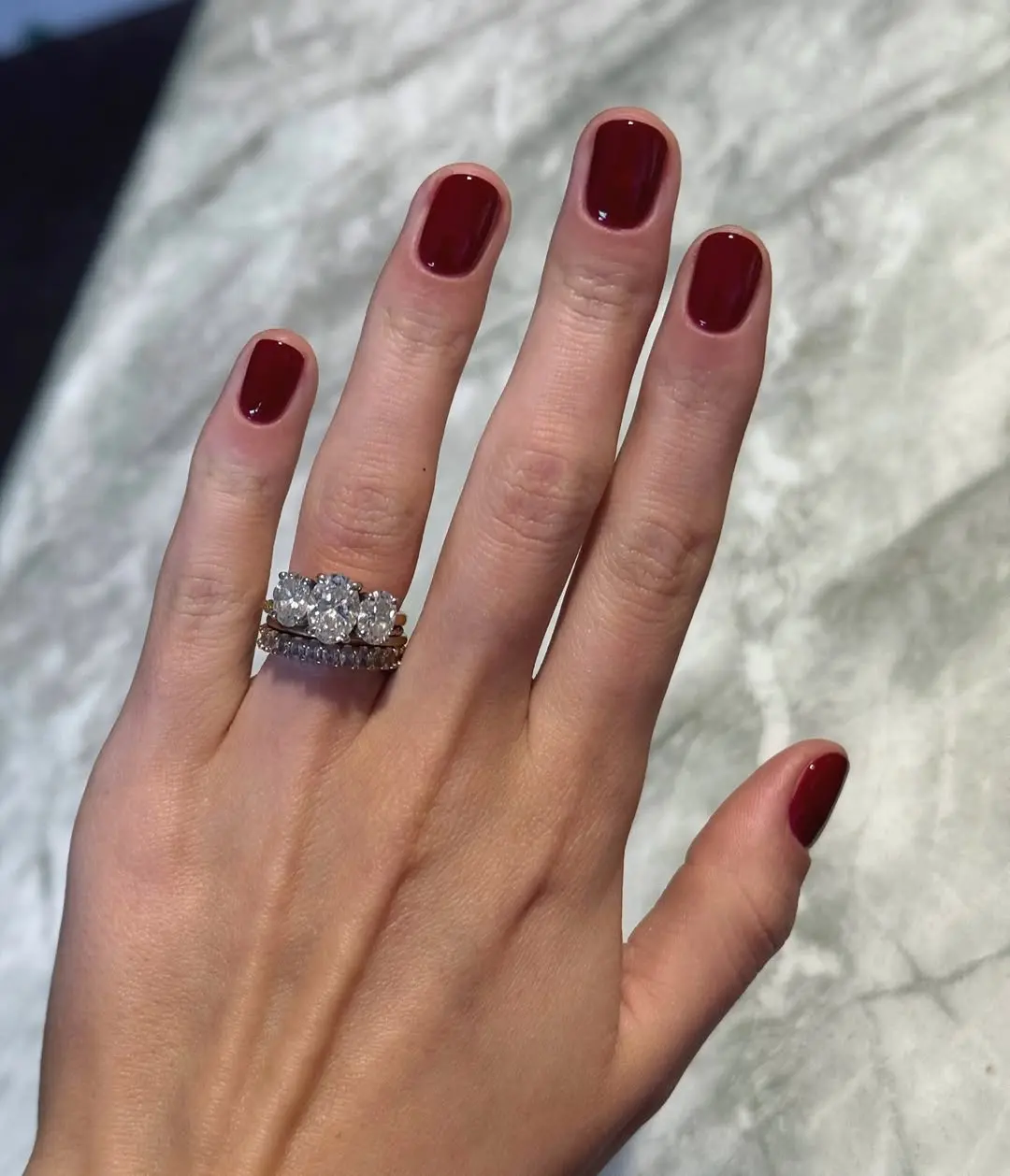 Elegant short nails with deep red polish