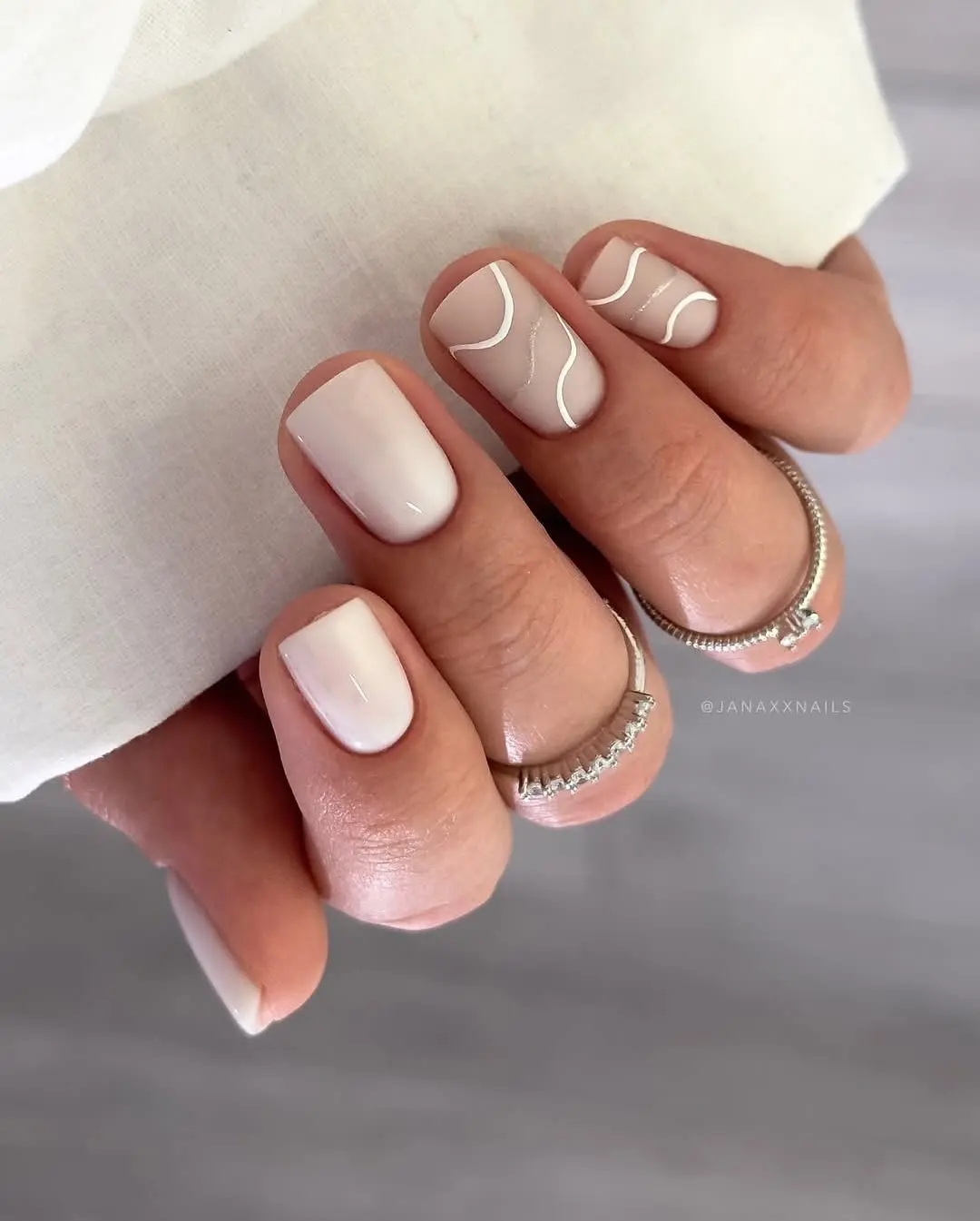 Elegant minimalistic short white nails design