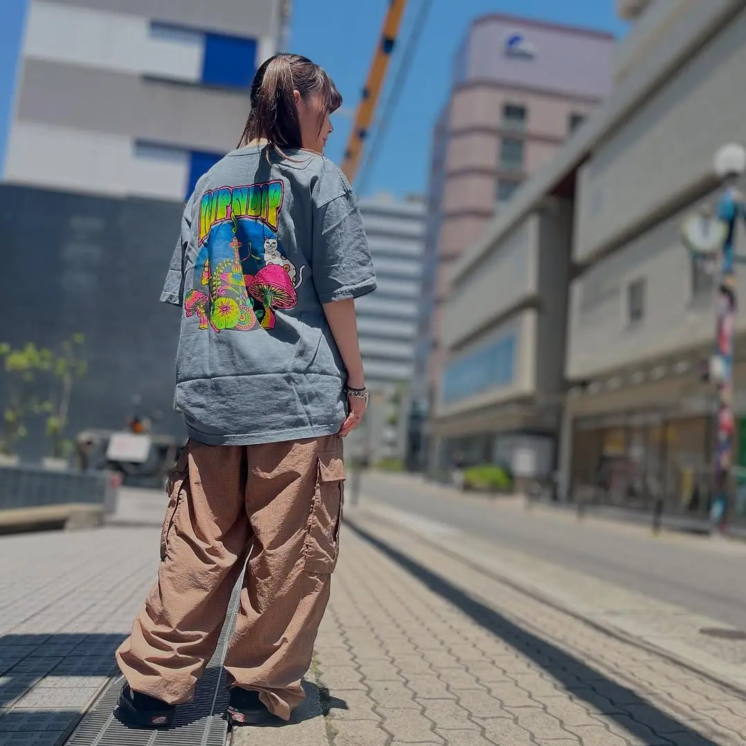 Bold Graphic Tee Paired with Cargo Pants