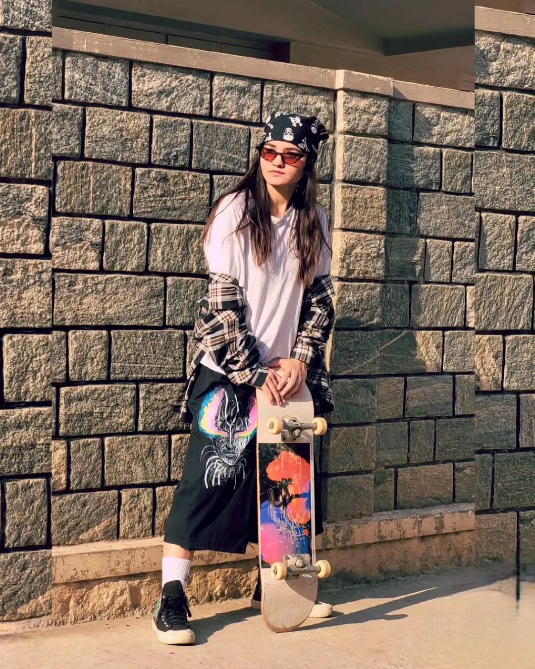 Stylish skateboarder embracing urban vibes