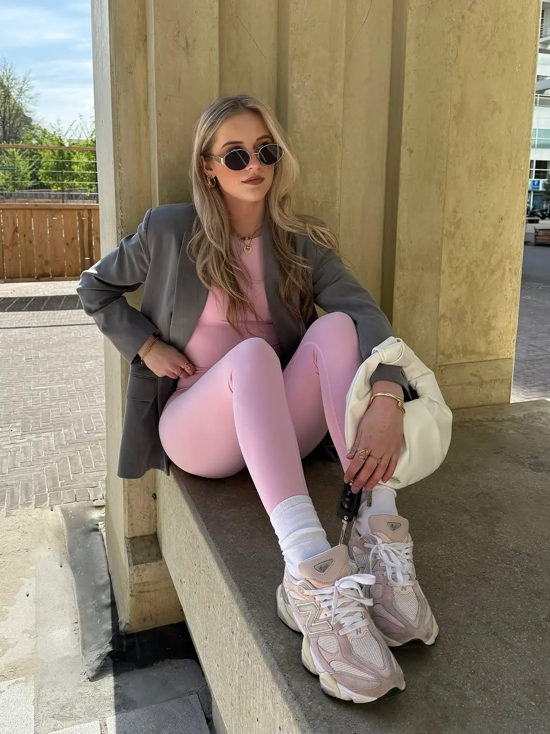 Chic sporty outfit with pink leggings and blazer