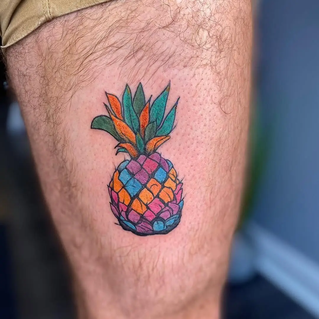 Vivid pineapple tattoo with playful colors and style