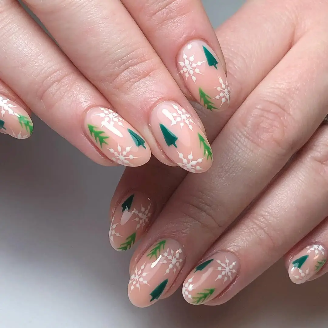 Festive winter nails with snowflakes and trees