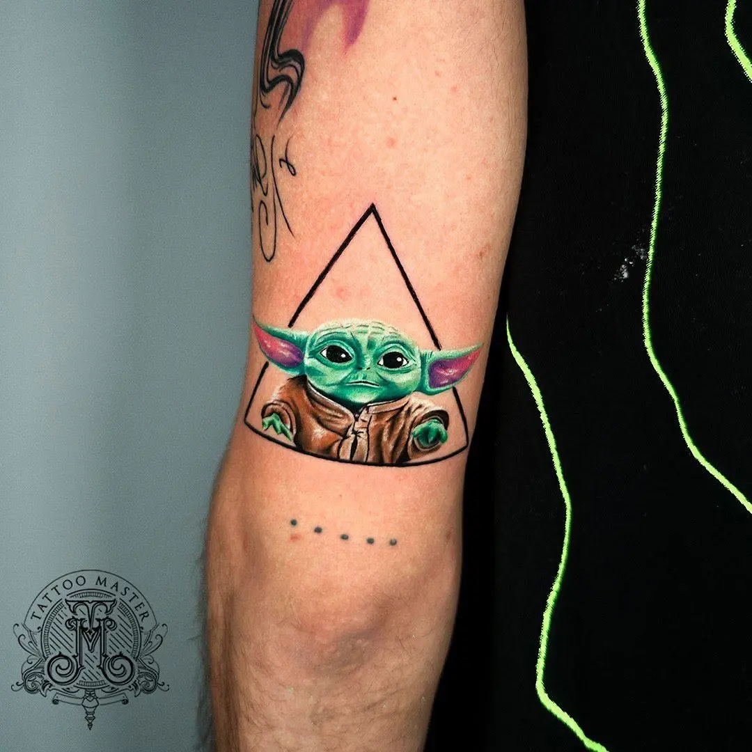 Adorable Grogu Tattoo in Unique Geometric Frame