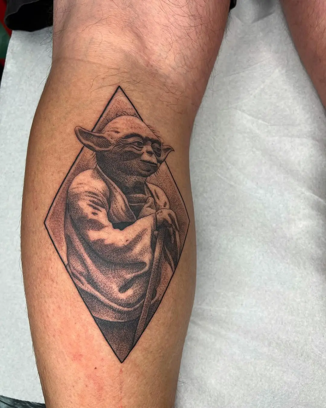 Stunning Yoda Tattoo in Geometric Design