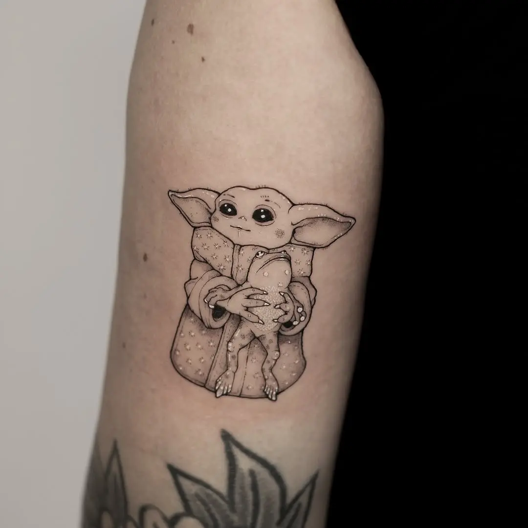Charming Yoda Tattoo with Childlike Wonder