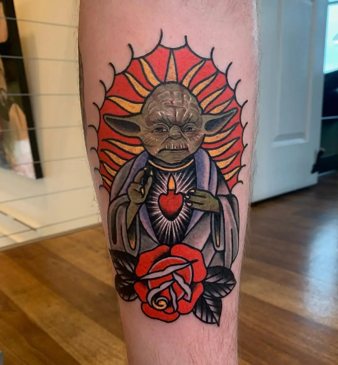 Vibrant Yoda Tattoo with Floral Elements
