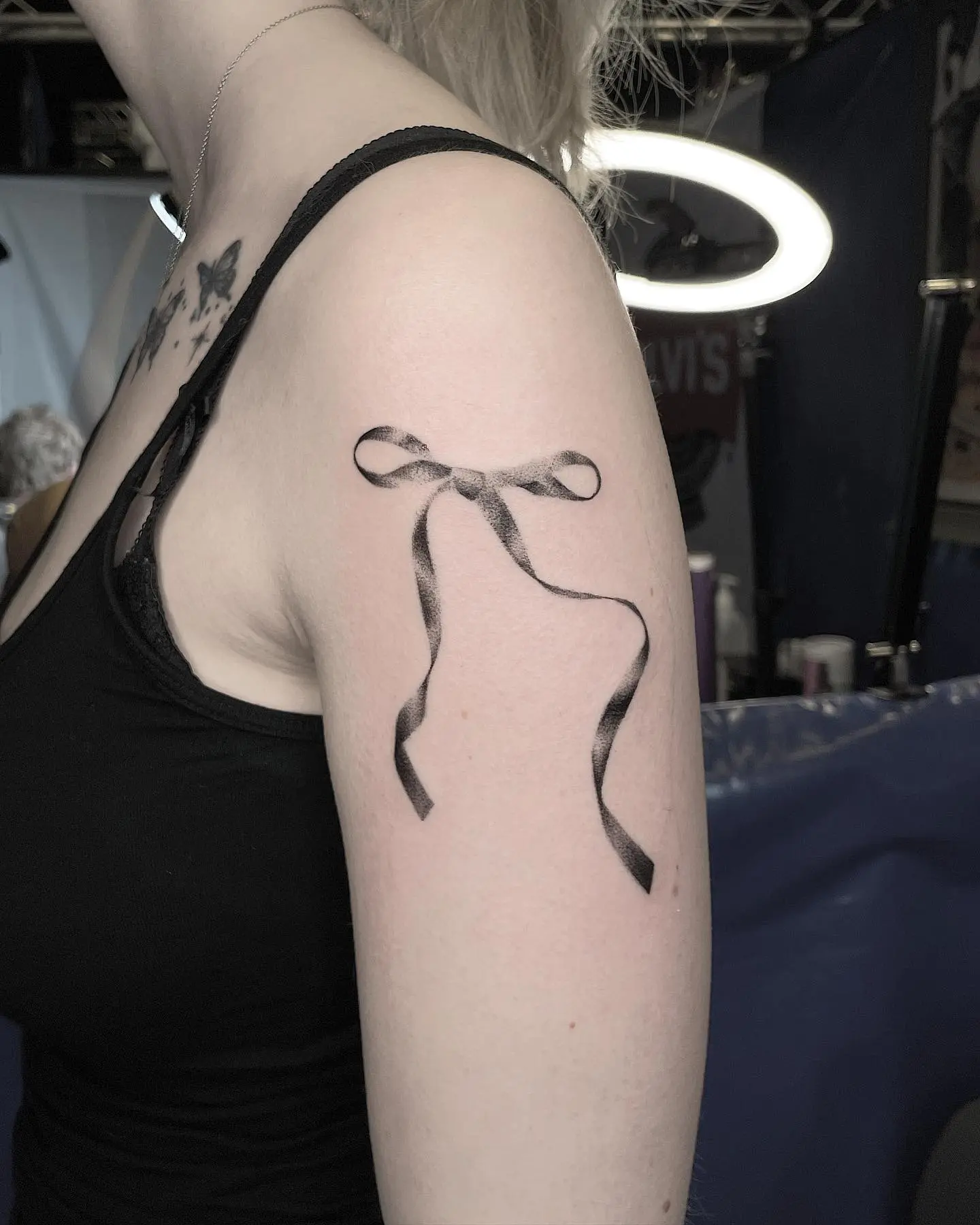 Elegant bow tattoo for a feminine touch