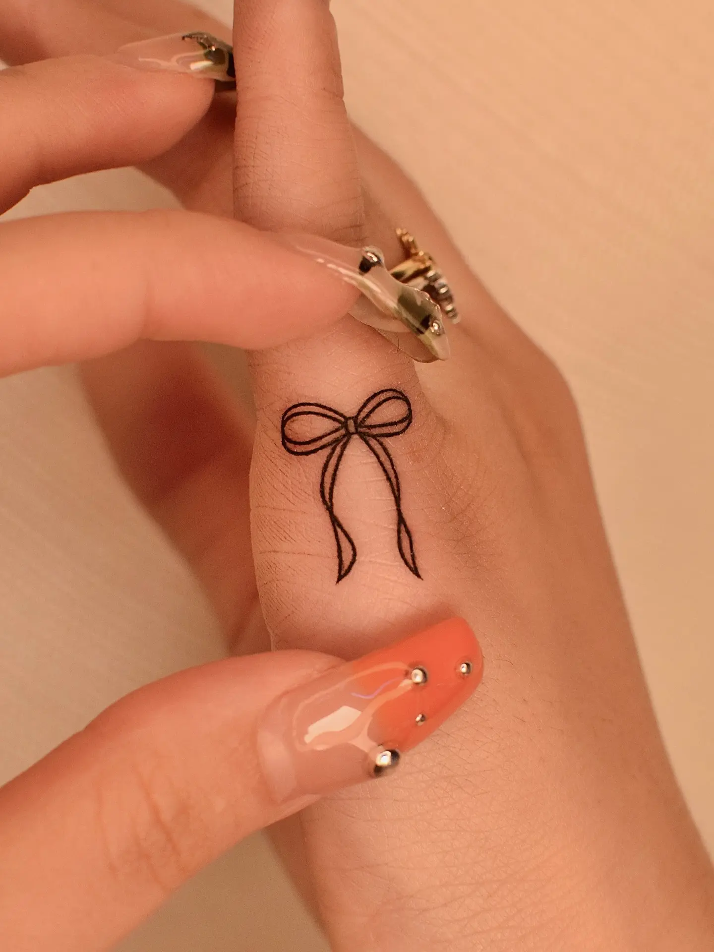 Charming and Simple Bow Tattoo Design