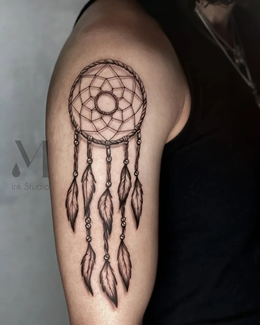 Elegant Dreamcatcher Tattoo in Intricate Detail