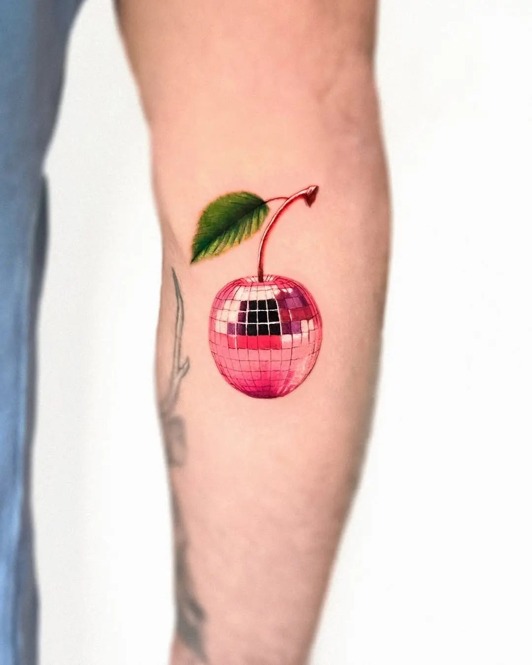 Unique disco ball cherry tattoo design inspiration