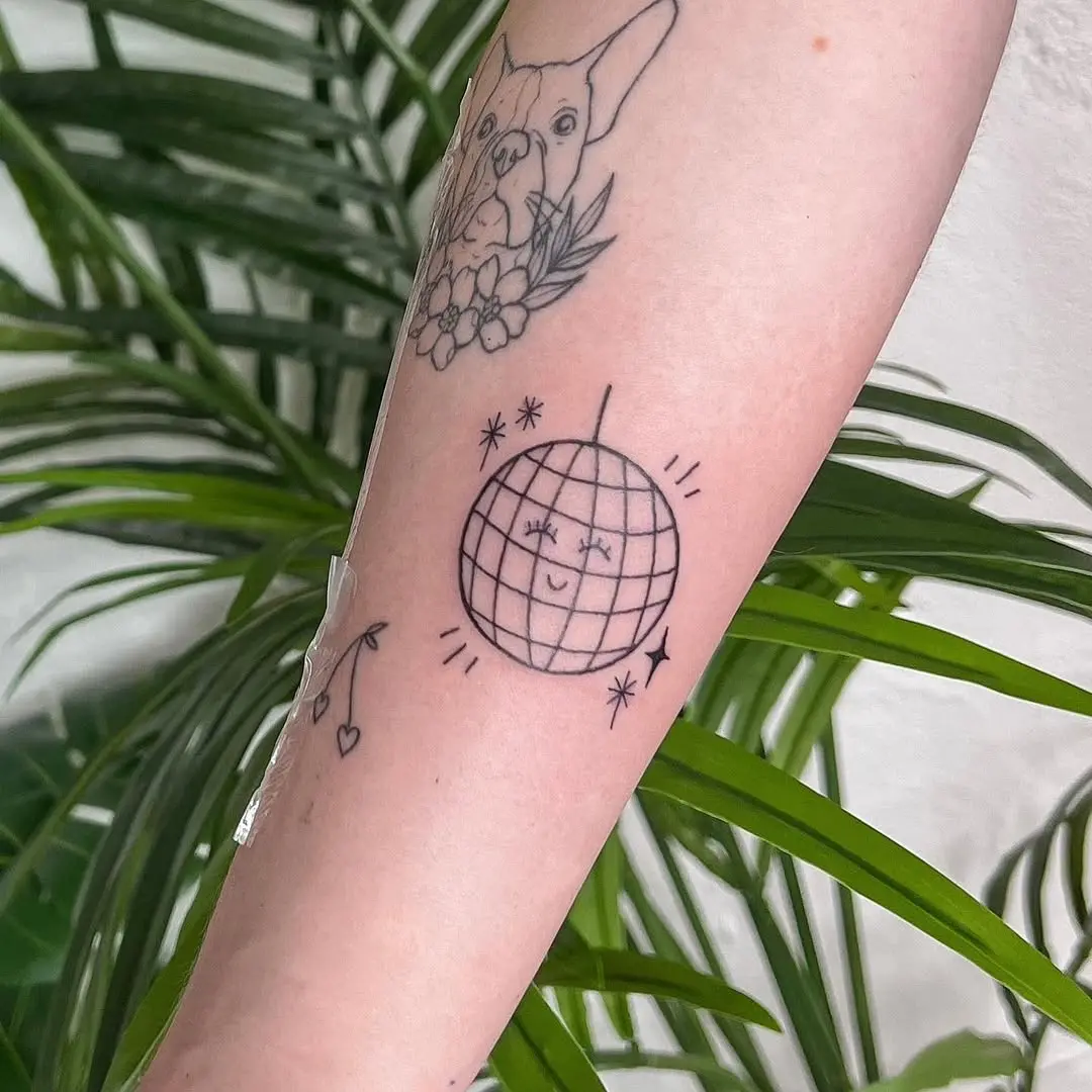 Charming Minimalist Disco Ball Tattoo Design