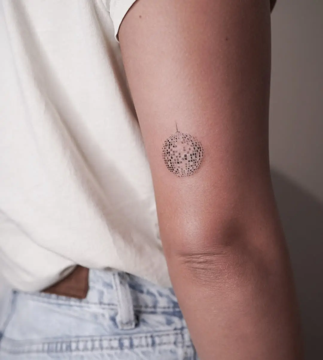 Minimalistic Disco Ball Tattoo on Arm