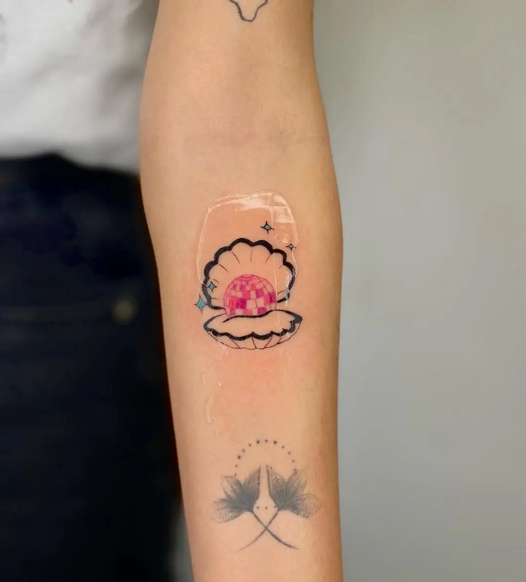 Whimsical clam shell with disco vibes