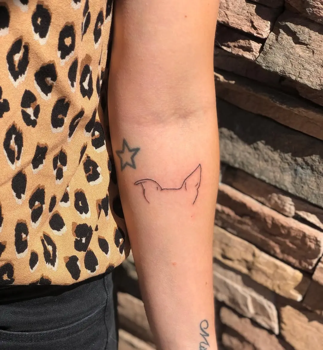 Minimalist Dog Ear Tattoo Design Inspiration