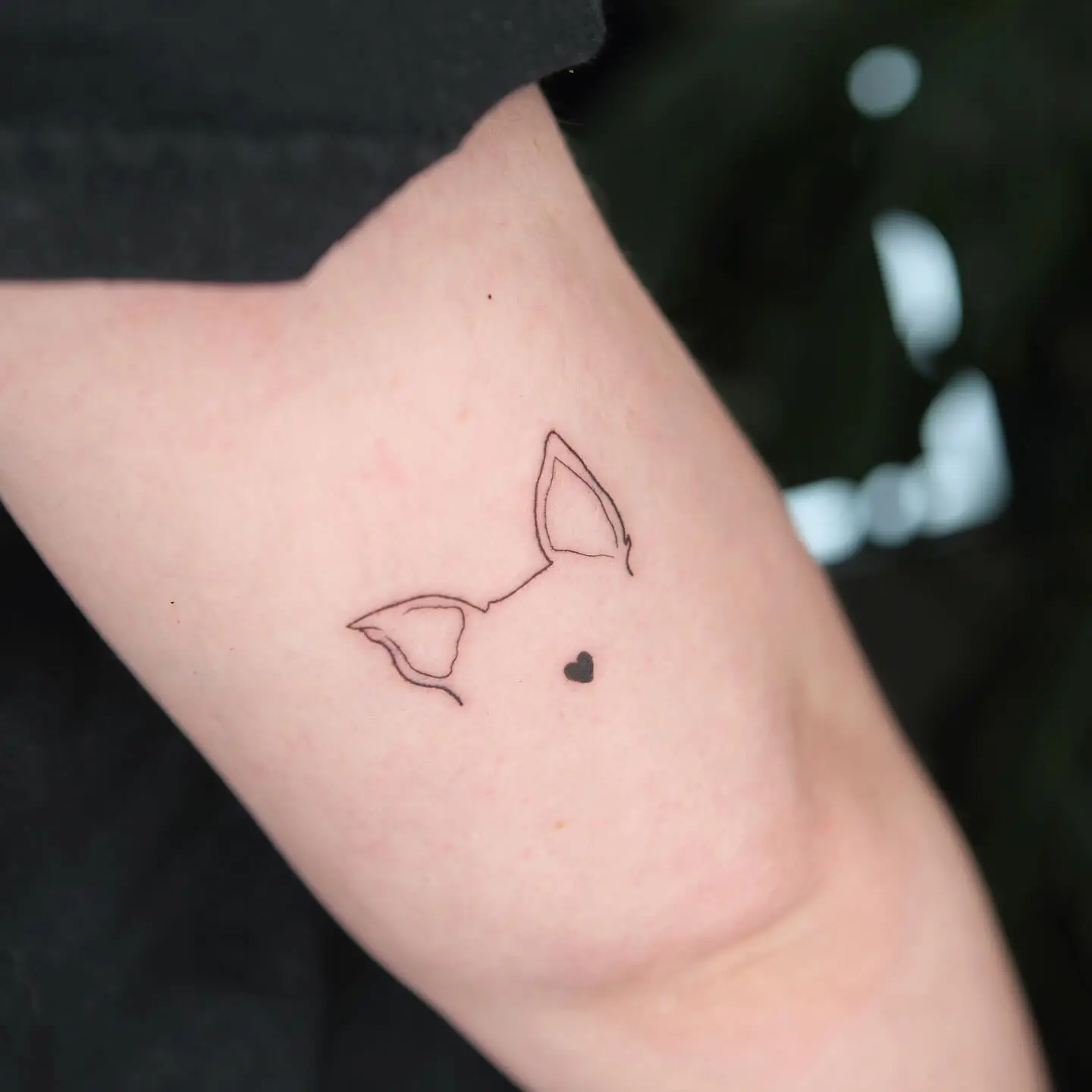 Cute Minimalist Dog Ear Tattoo Design