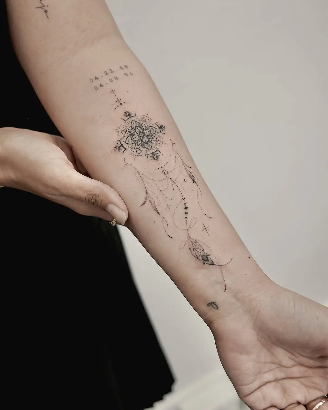 Intricate flower dreamcatcher tattoo design