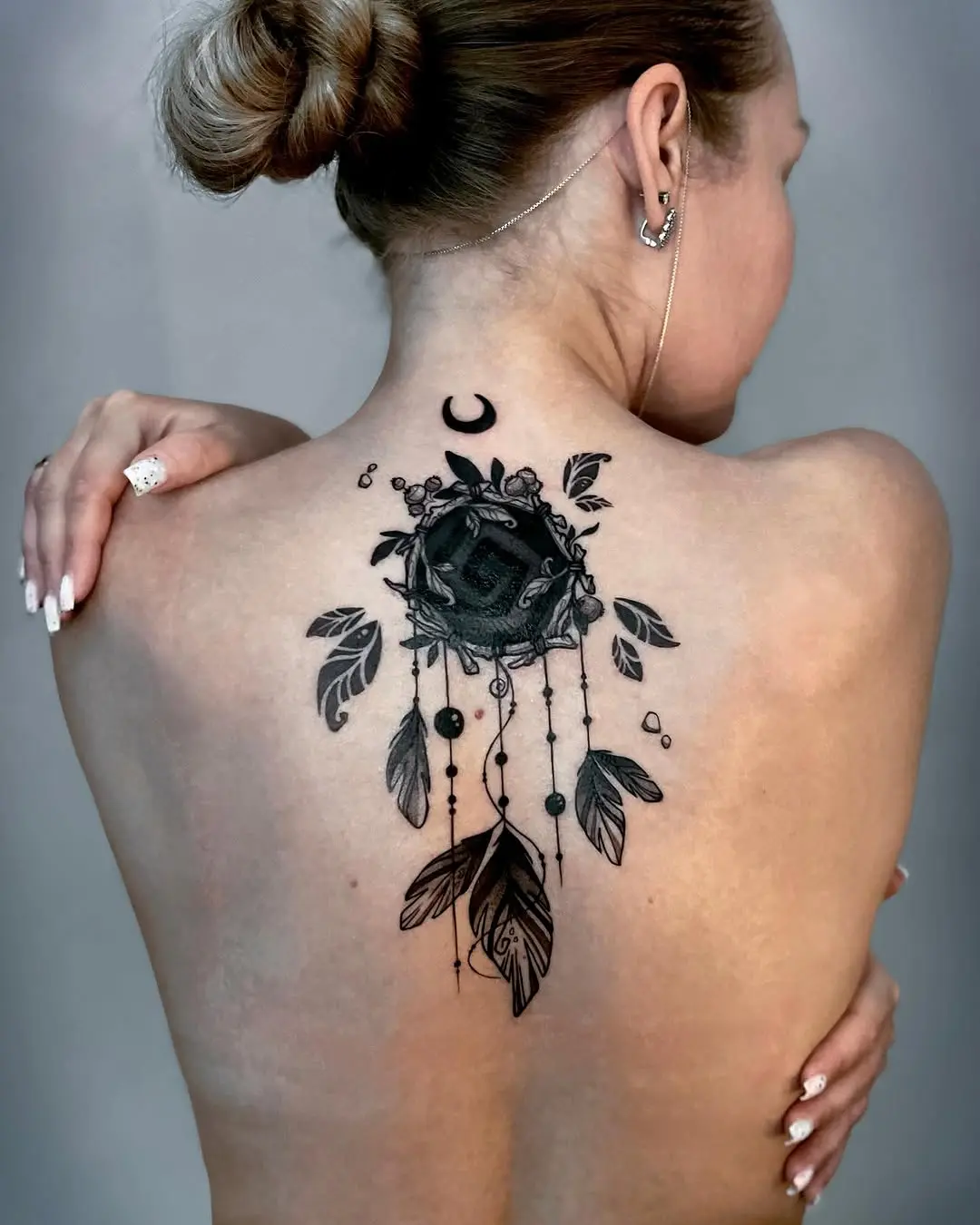 Stylish Dreamcatcher Tattoo with Floral Elements