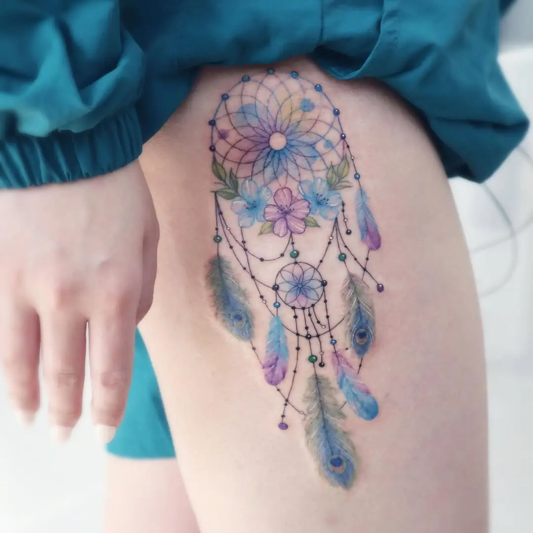 Vibrant Dreamcatcher Tattoo with Floral Elements