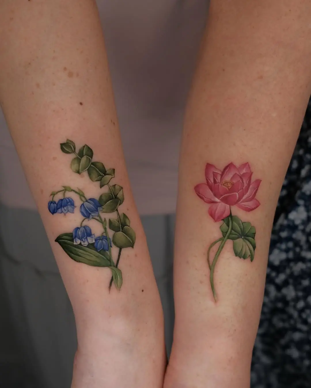 Elegant eucalyptus and flower tattoo designs.