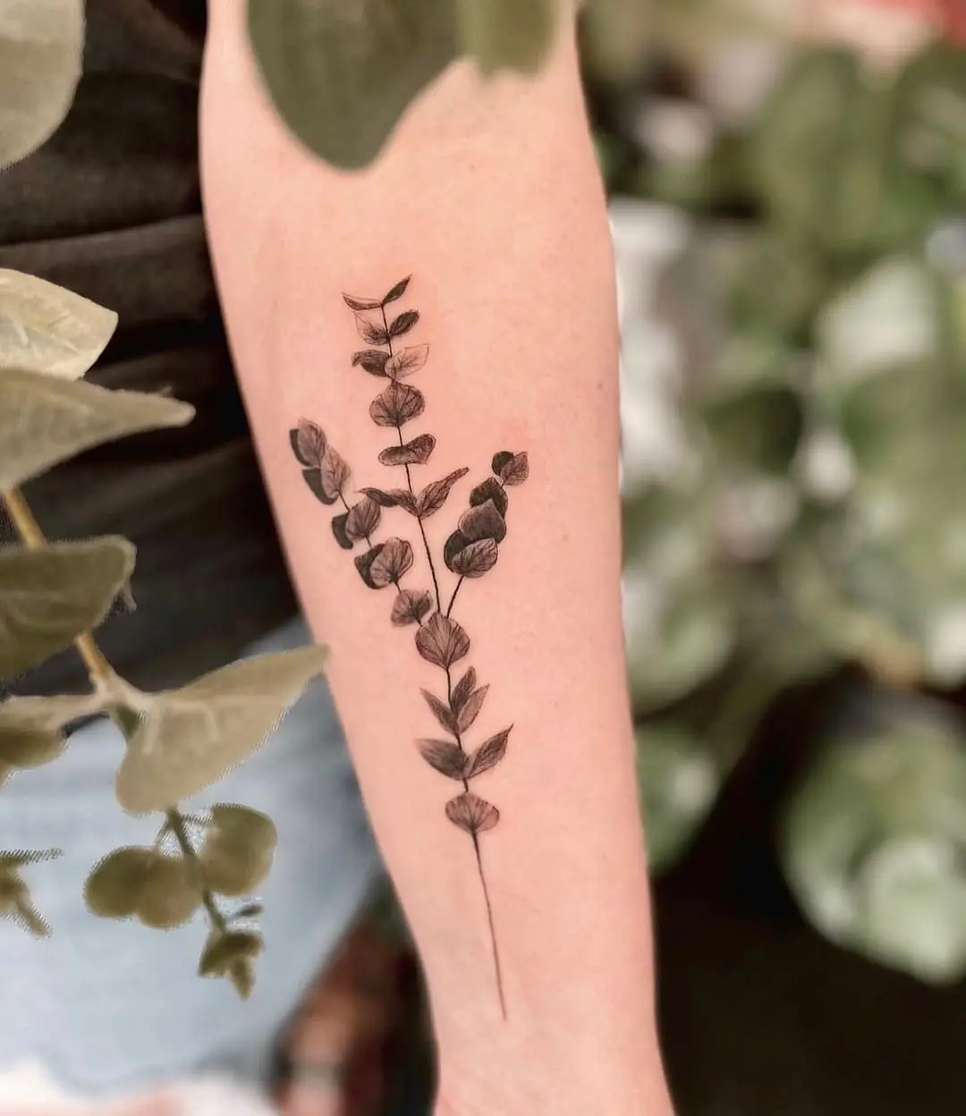 Elegant eucalyptus design gracing the forearm