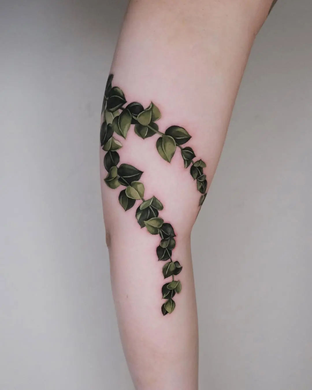 Elegant eucalyptus tattoo with leafy details