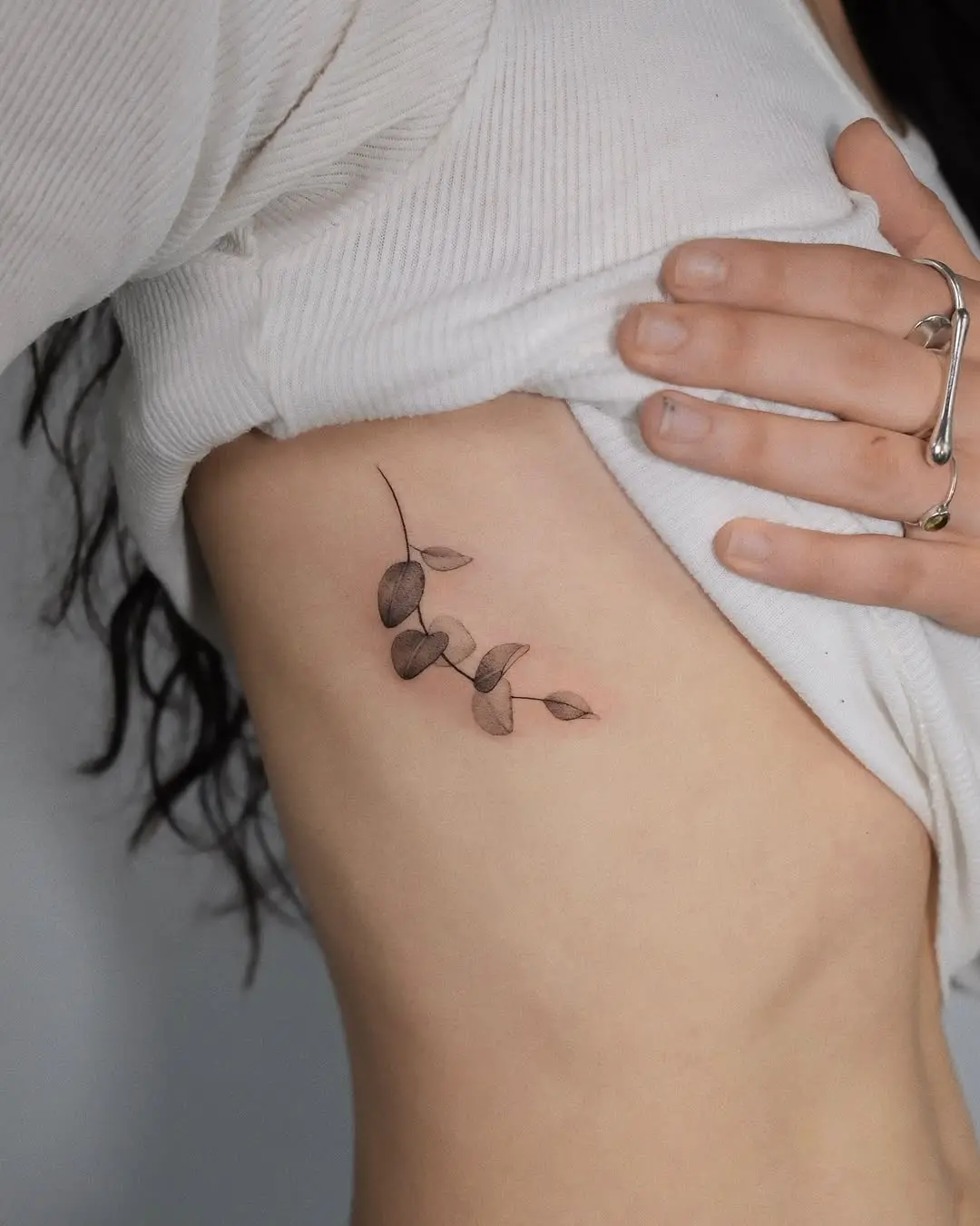 Elegant eucalyptus tattoo on the arm