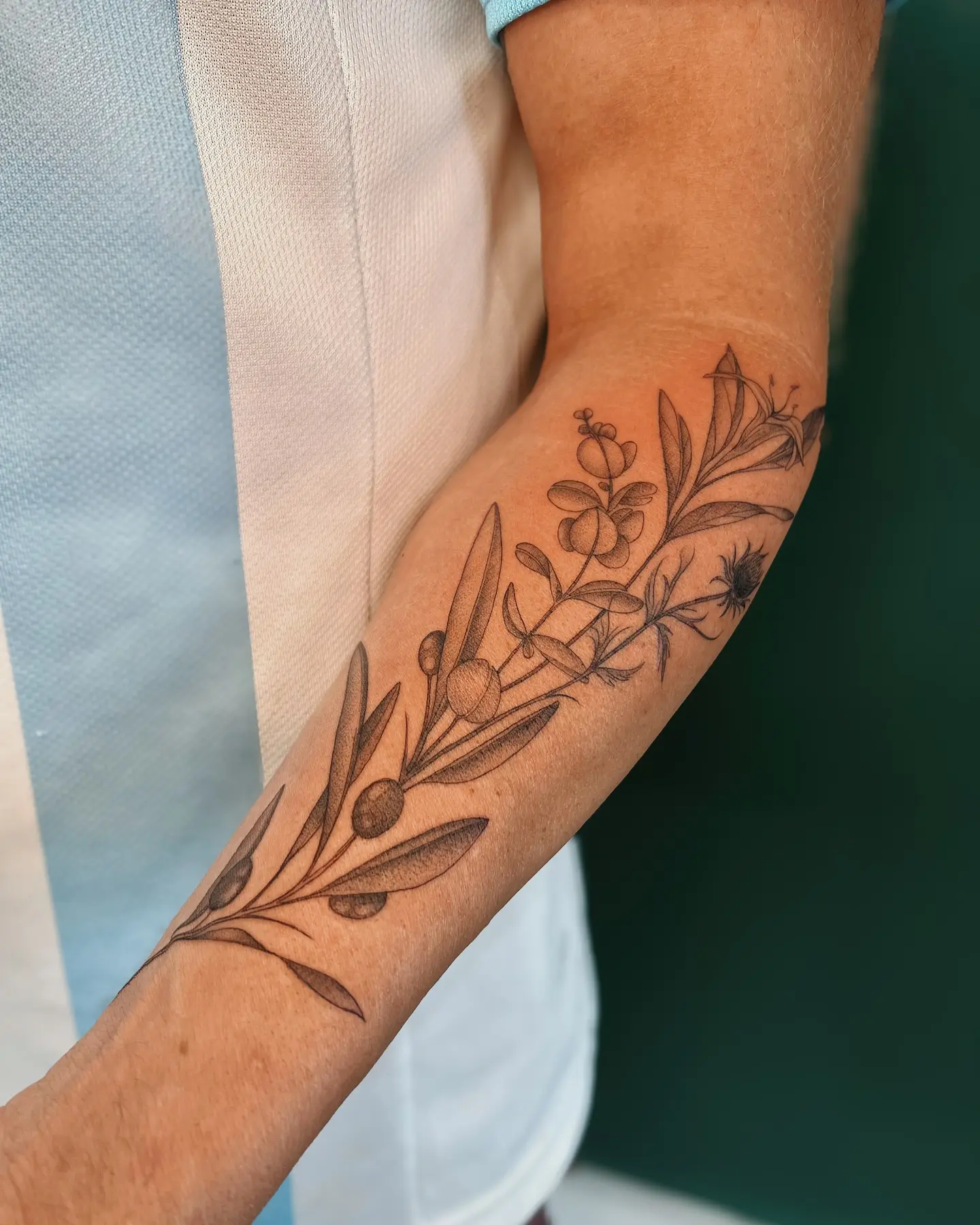 Elegant eucalyptus design on the forearm
