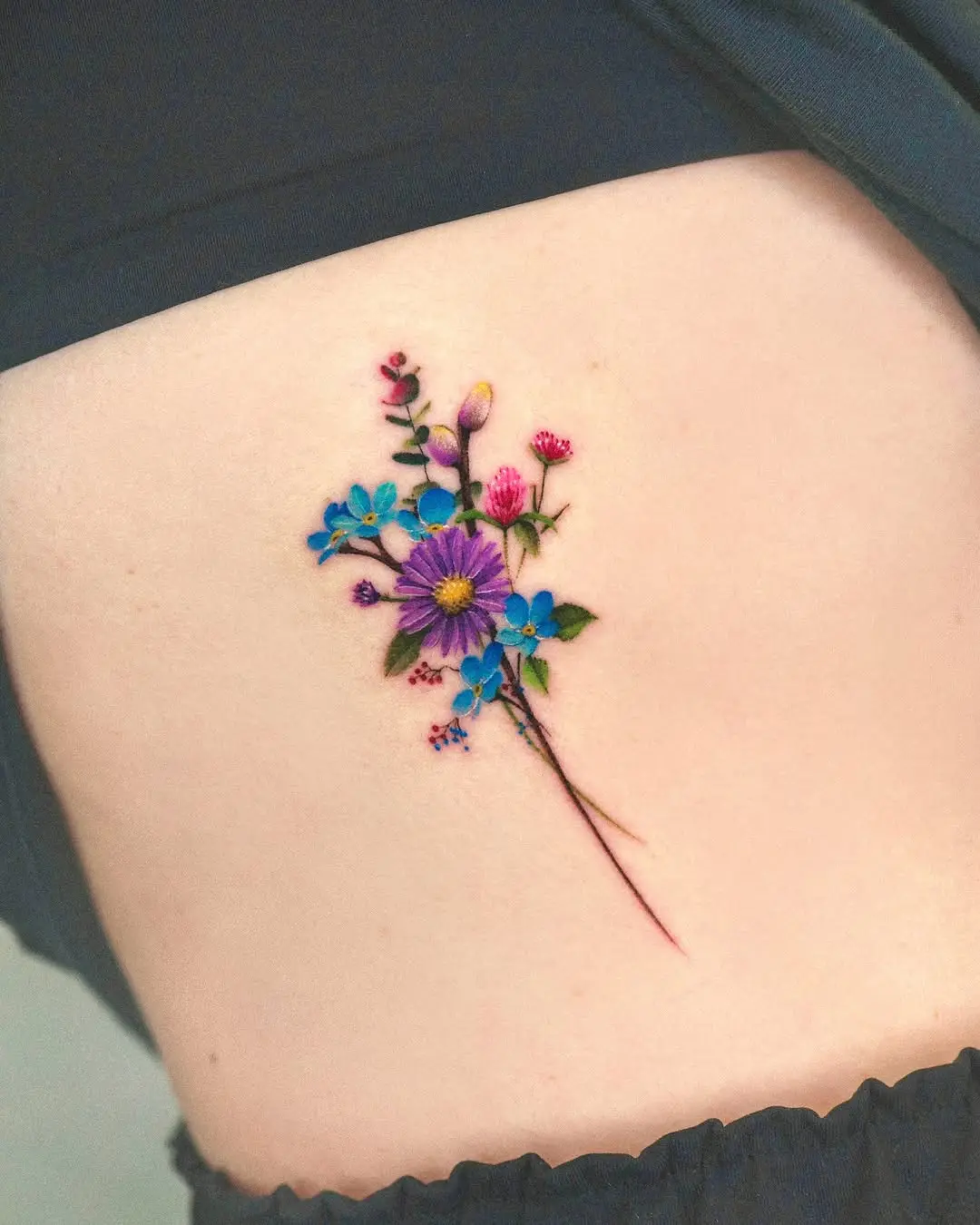 Vibrant Floral Eucalyptus Tattoo Design