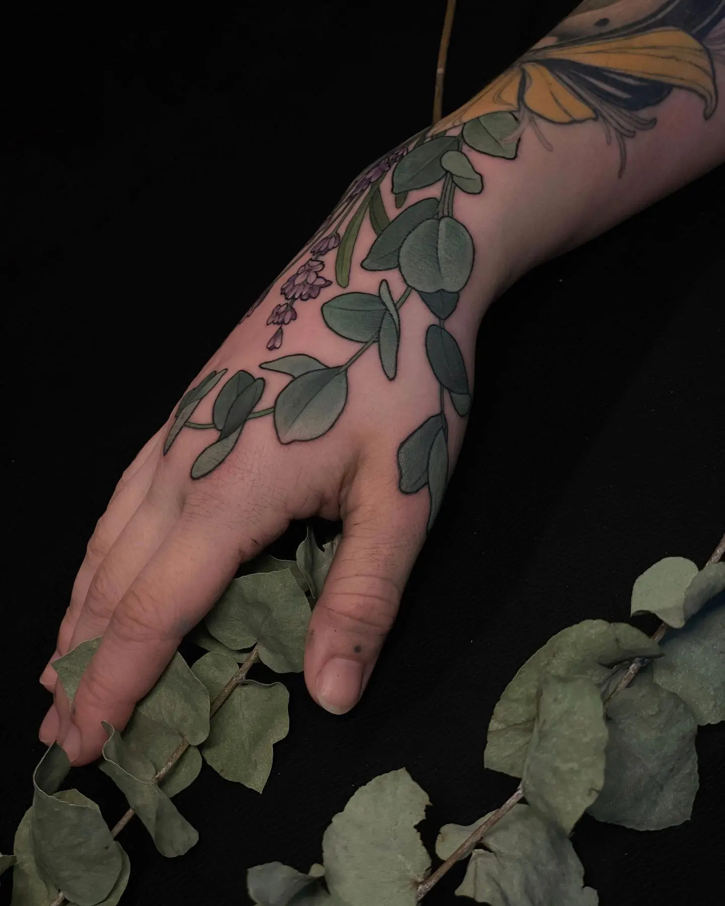 Intricate Hand Tattoo of Eucalyptus Leaves