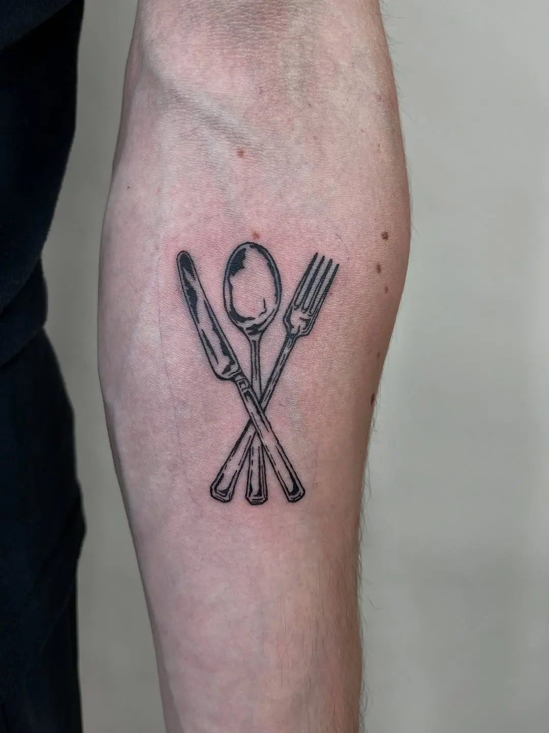 Unique fork and knife tattoo design inspiration