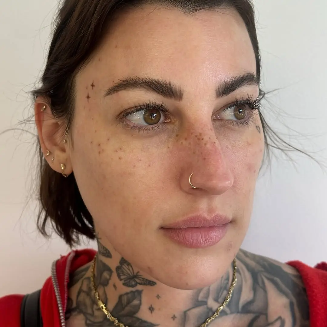 Freckle tattoos enhance natural beauty with playful charm.